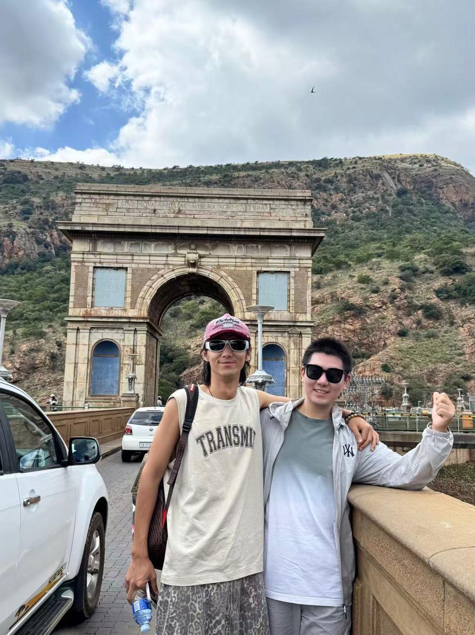 Travellers at the arch